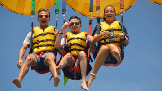 Family smiling during Parasail Ride in Miami